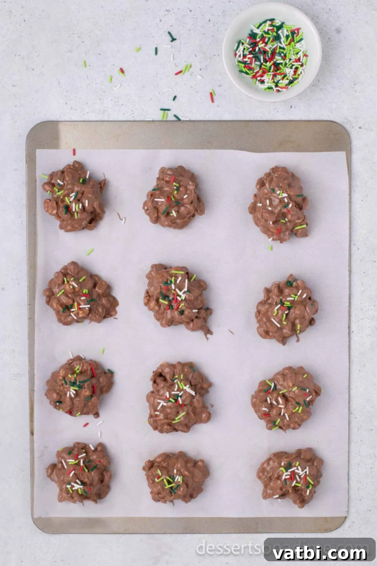 Sprinkles on top of each candy.