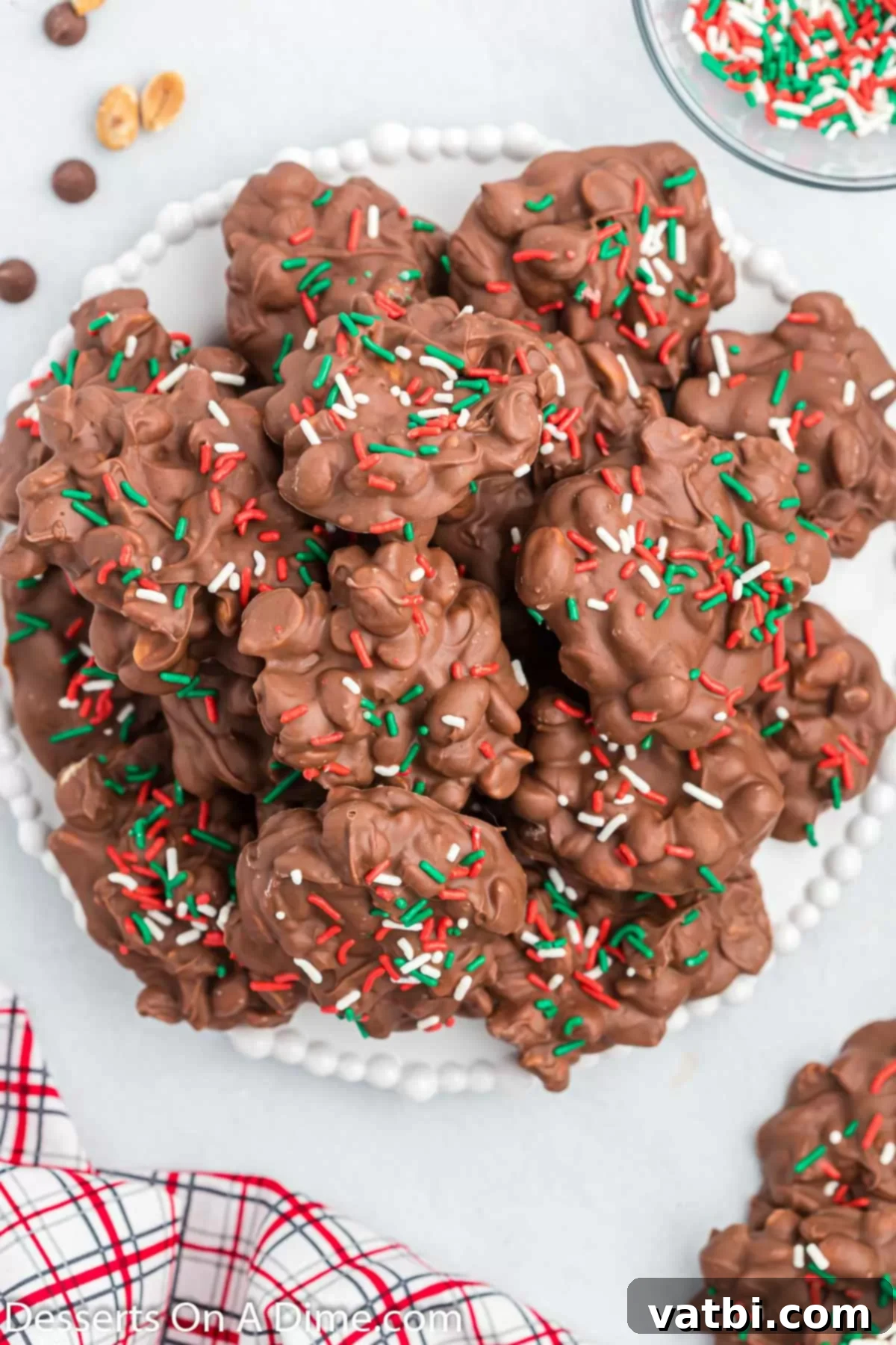Crock pot christmas candy on a platter.