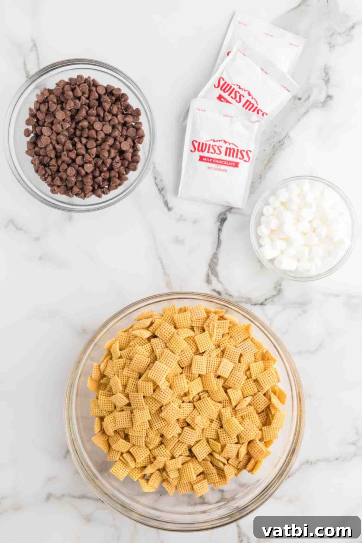 Cozy Cocoa Crunch Mix 3 Ingredients for hot chocolate puppy chow - milk chocolate chips, chex cereal, hot chocolate mix, mini marshmallows,.