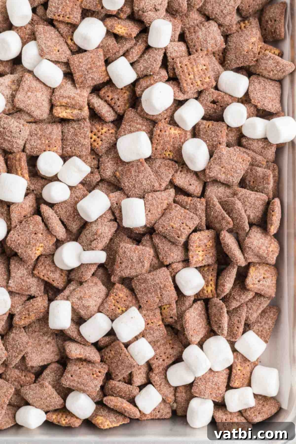 Cozy Cocoa Crunch Mix 10 Baking sheet of hot chocolate puppy chow.