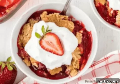 Effortless Dump Cake Delights 3 A warm, bubbly strawberry dump cake in a baking dish, ready to be served.