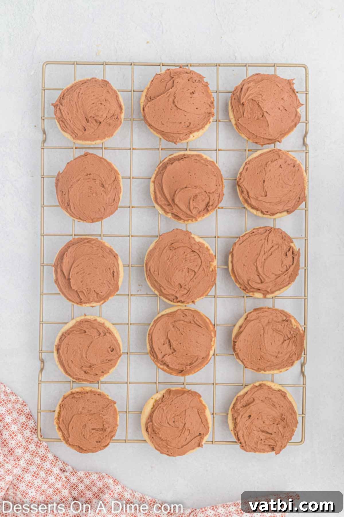 Frosting spread on cookies.