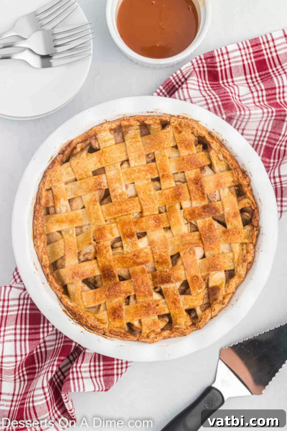 Indulgent Salted Caramel Apple Pie 12 Salted Caramel Apple Pie in a pie plate.