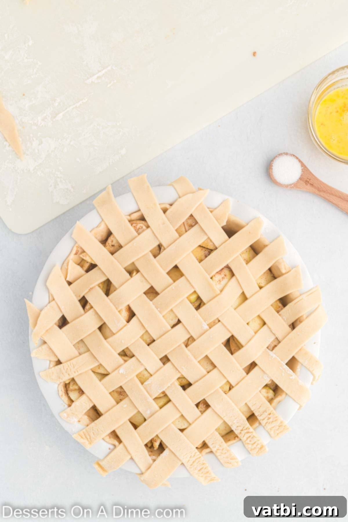 Indulgent Salted Caramel Apple Pie 10 Lattice weaved on top of pie.