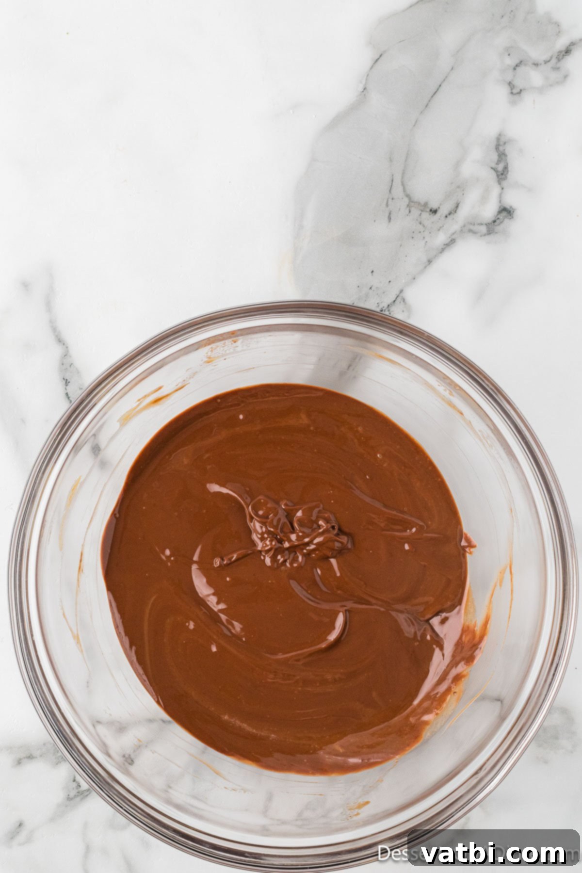 Perfect Harvest Puppy Chow Recipe 5 Melted chocolate in a bowl.