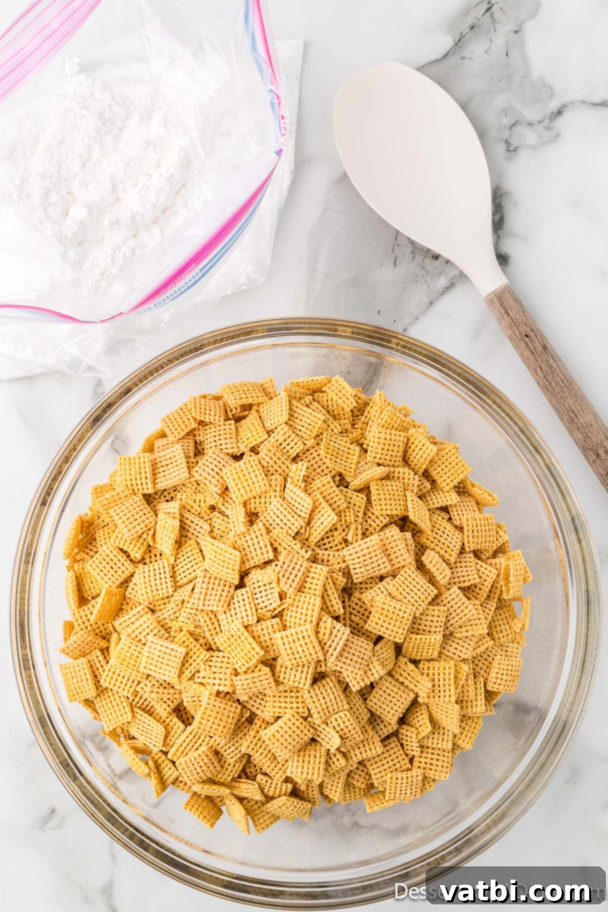 Perfect Harvest Puppy Chow Recipe 6 Cereal in a mixing bowl.