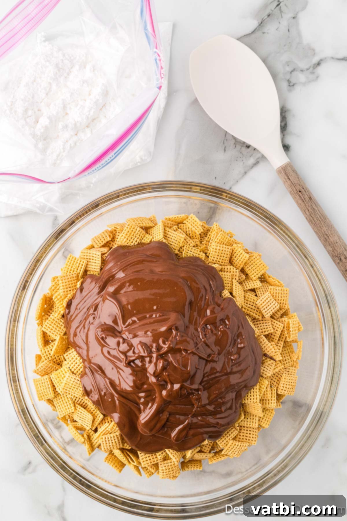 Perfect Harvest Puppy Chow Recipe 7 Chocolate melted and poured over cereal.