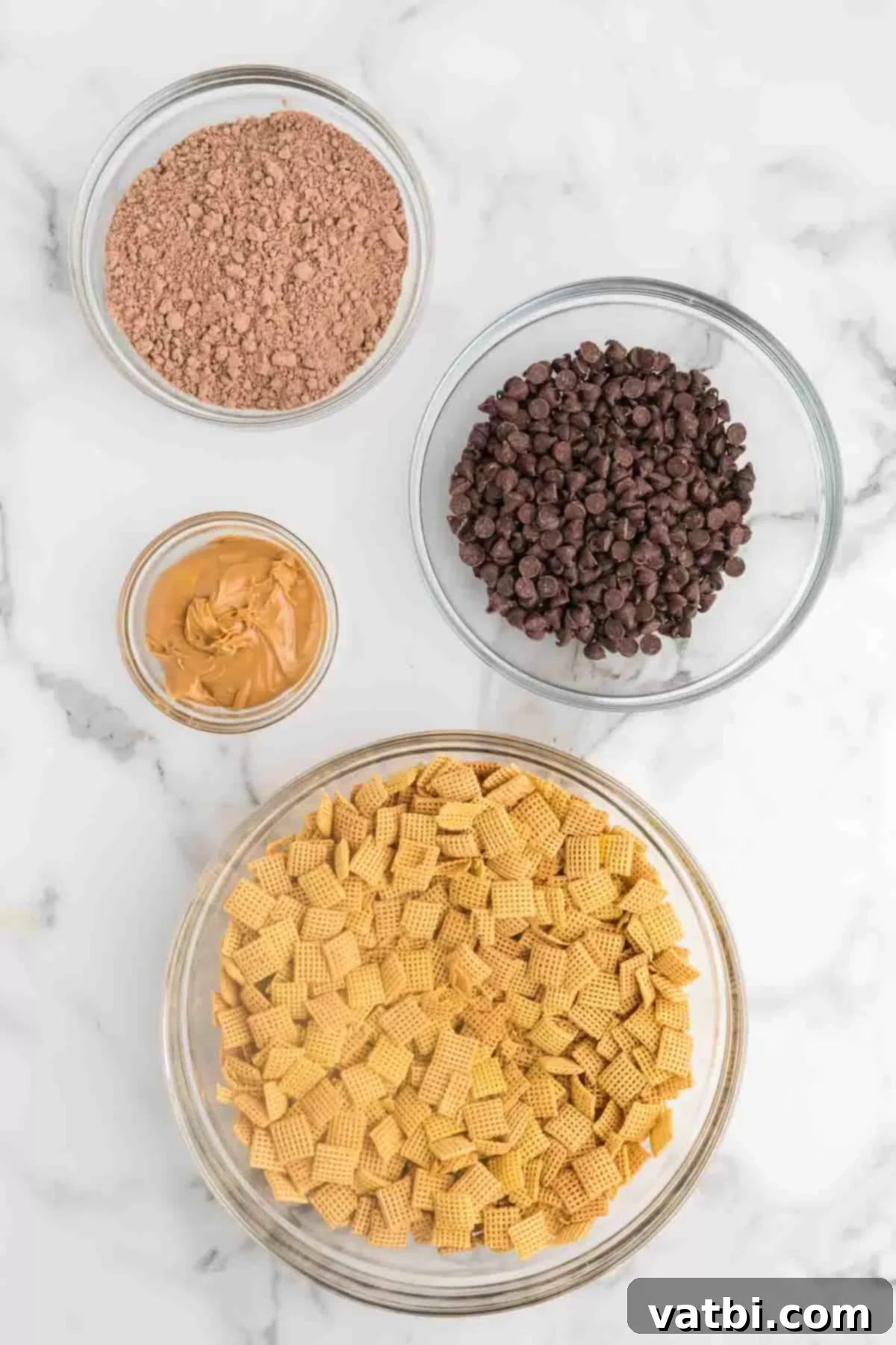 Decadent Brownie Muddy Buddies 3 The four simple ingredients for Brownie puppy chow: Chex cereal, chocolate chips, creamy peanut butter, and dry brownie mix.