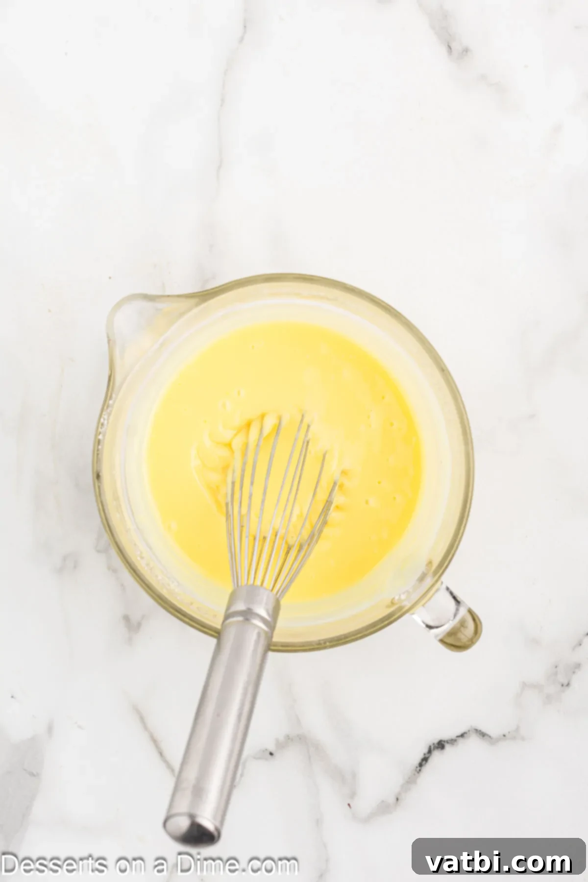 Red Velvet Dream Cups 6 Vanilla pudding mix and cold milk whisked together in a bowl.
