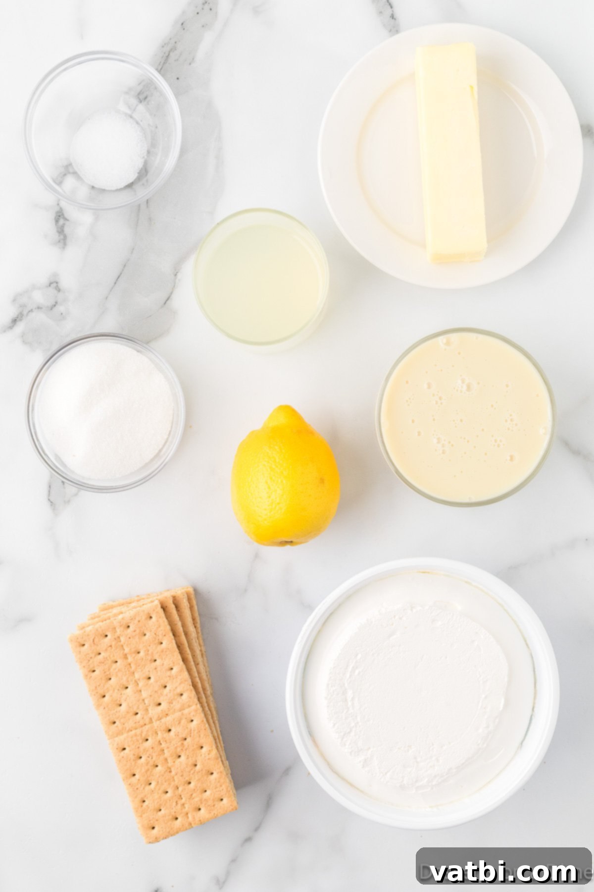 Tangy Lemon Delight 3 Ingredients for pie - graham cracker crumbs, salt, lemon zest, whipped cream.
