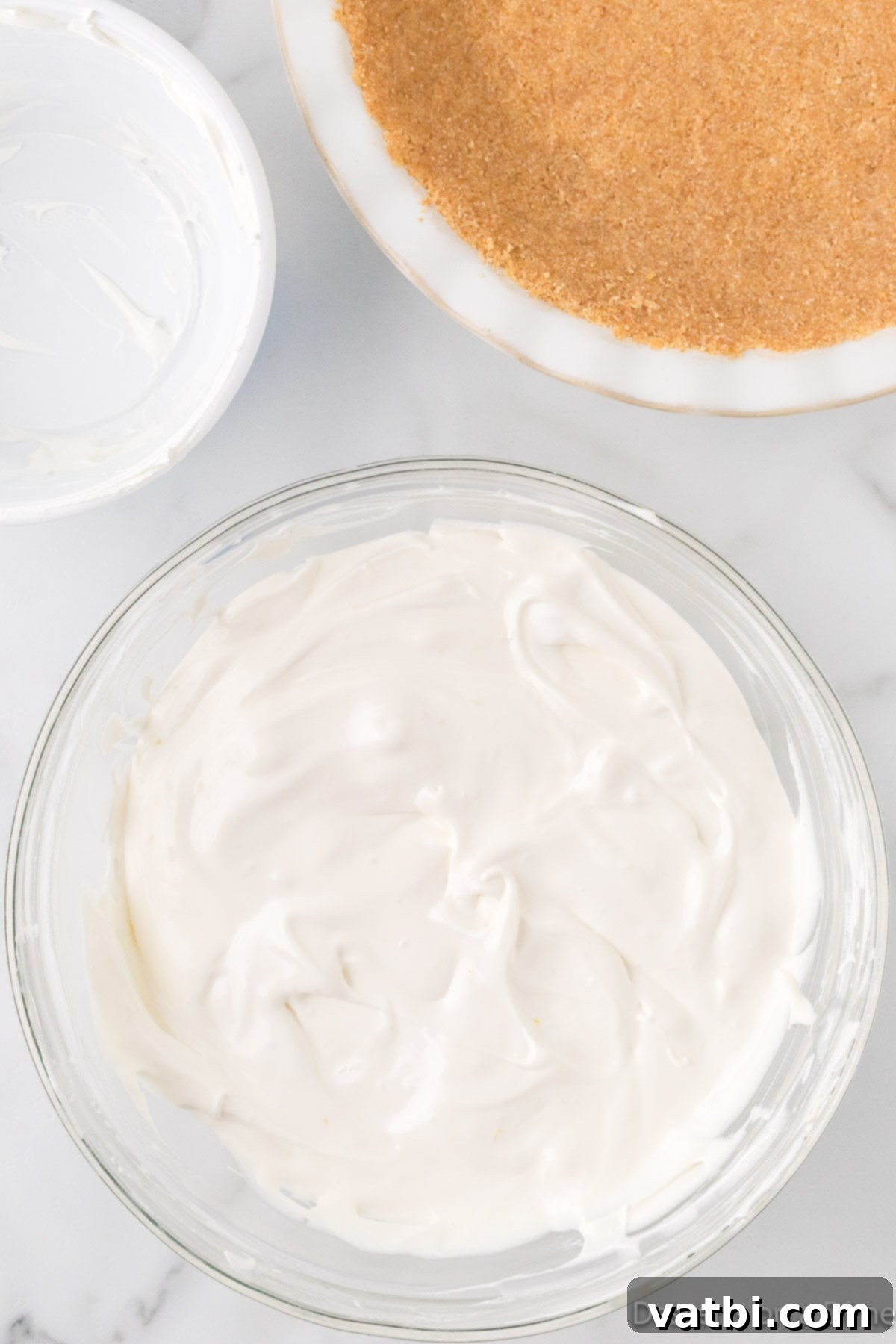 Tangy Lemon Delight 8 Whipped topping folded into mixture.