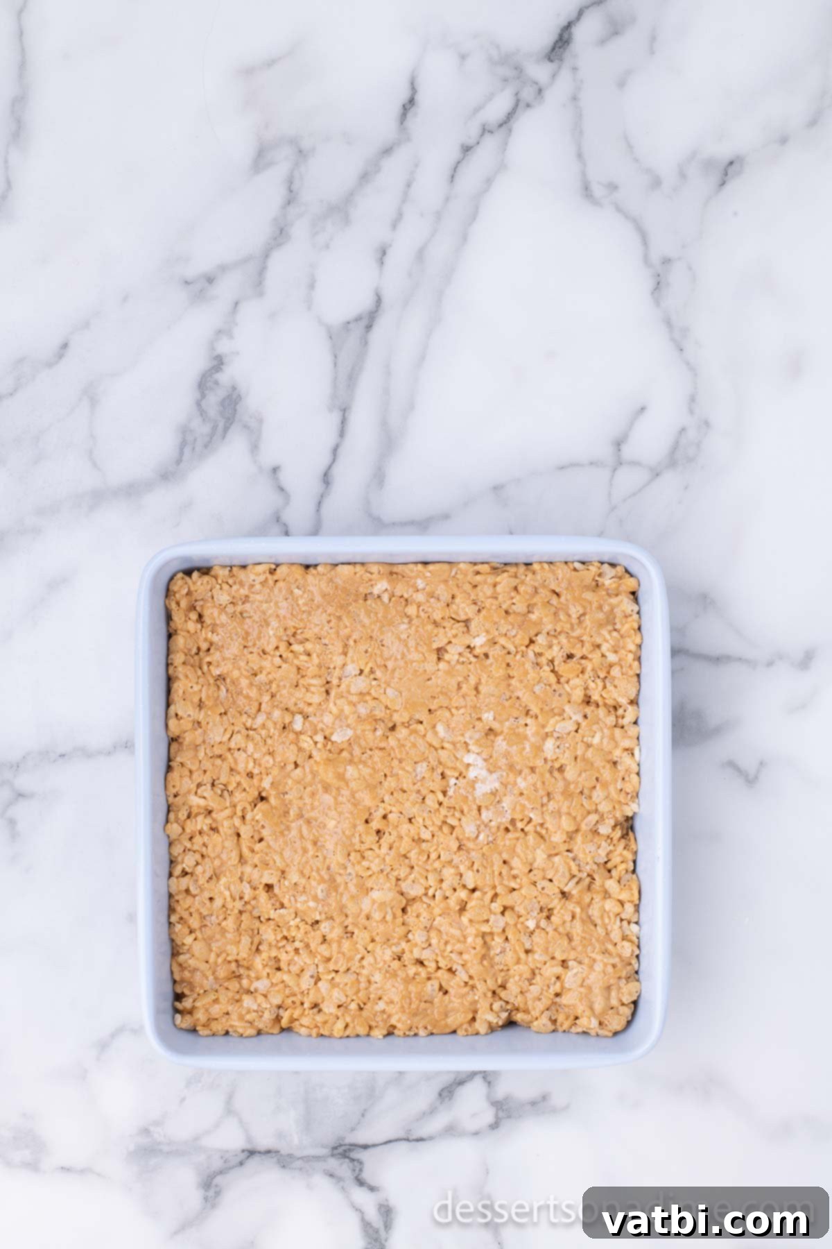 Speculoos Krispie Delights 7 Mixture waiting to set before slicing.