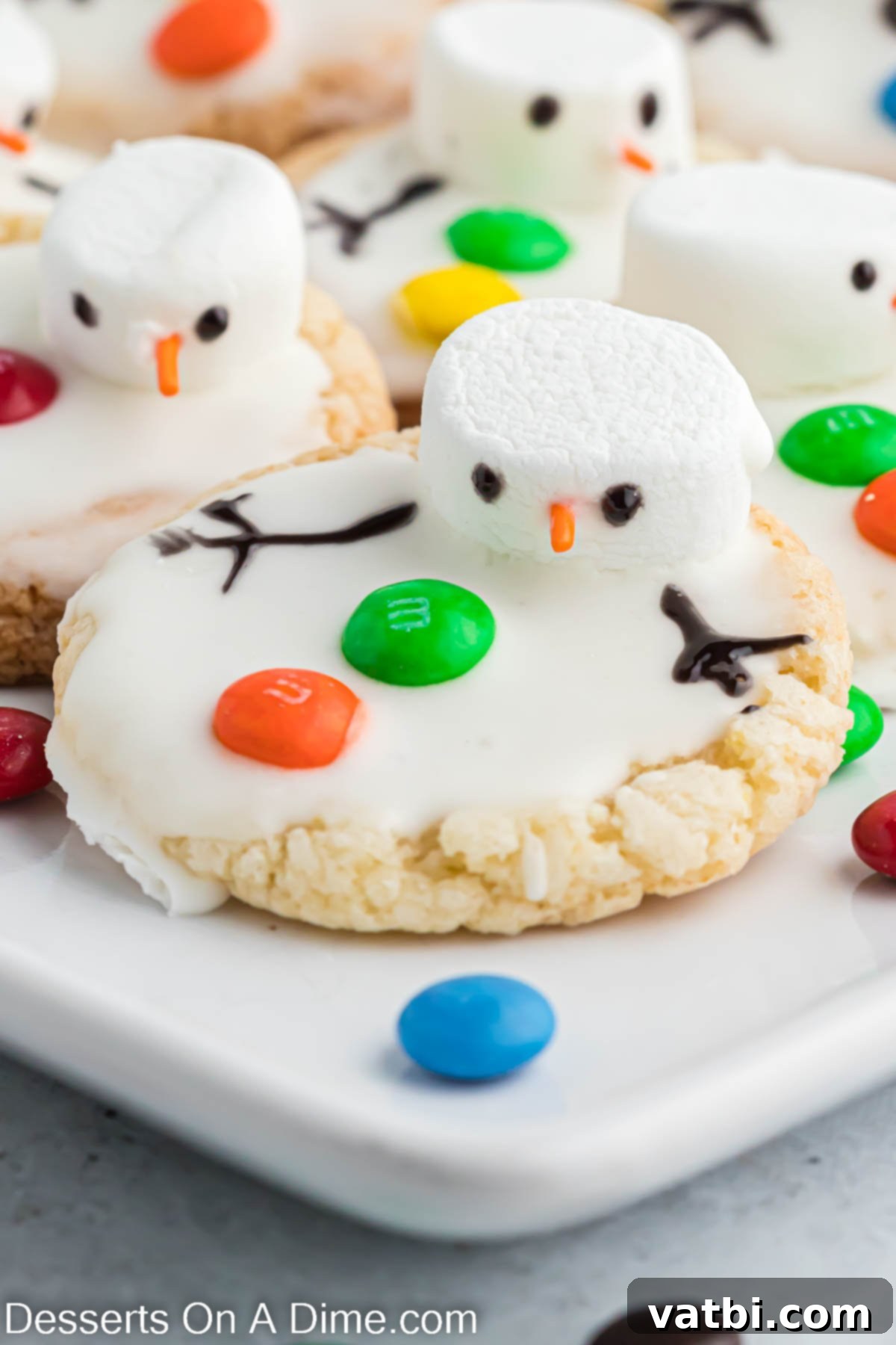 Adorable Melted Snowman Cookies 2 Melted snowman cookies up close.