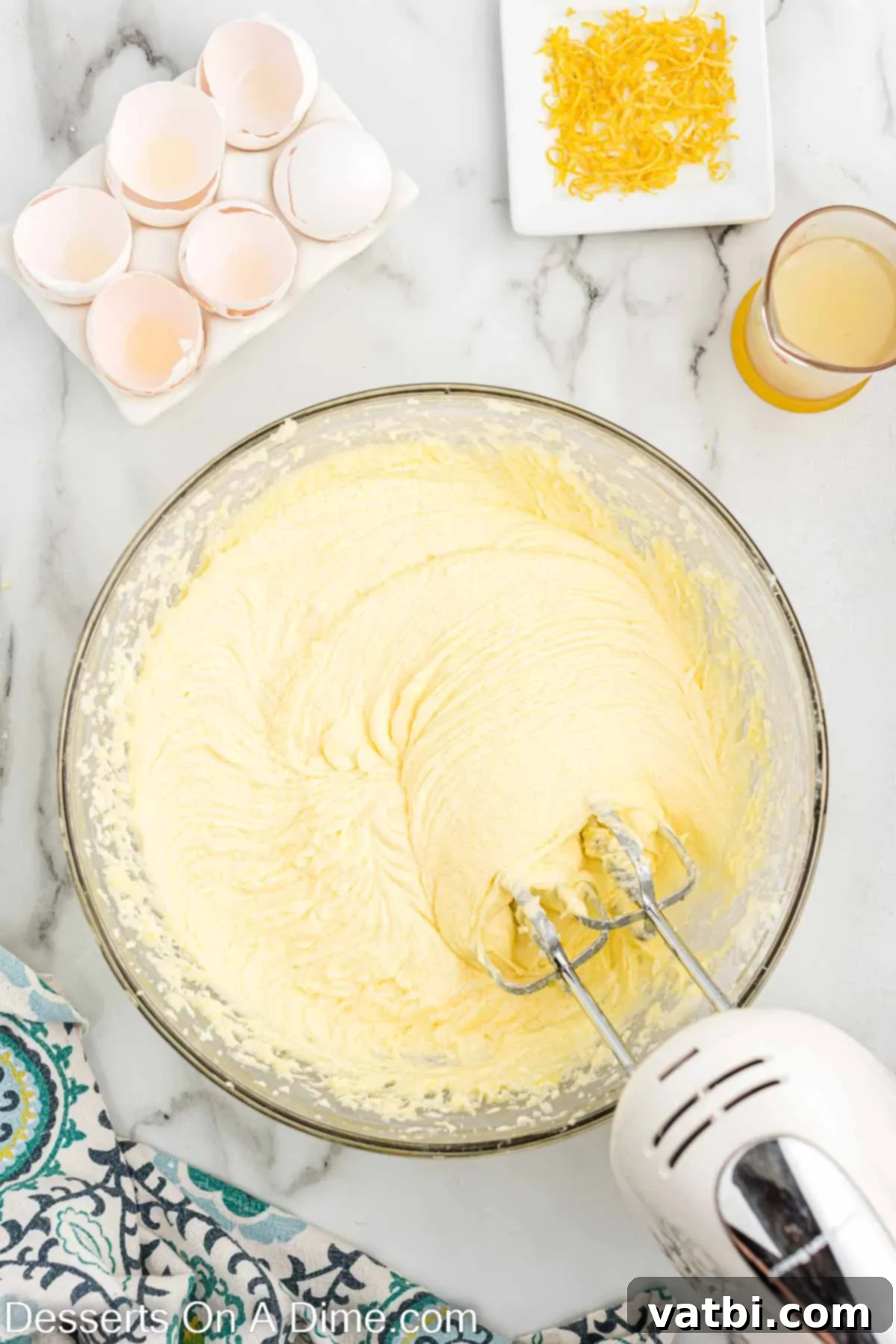 Cake batter mixed until smooth and fully combined after adding eggs.