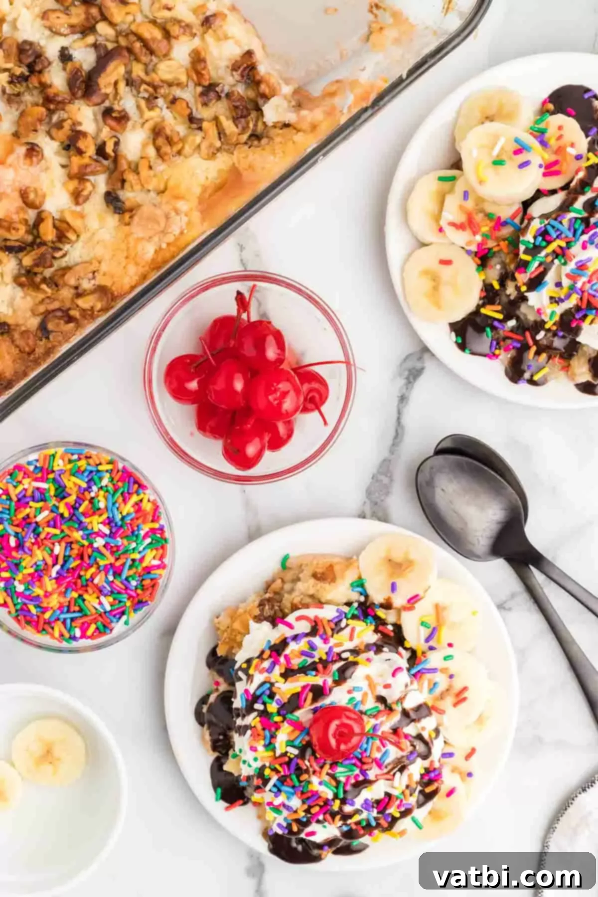 Decadent Banana Split Dump Cake 5 Banana split dump cake in a bowl.