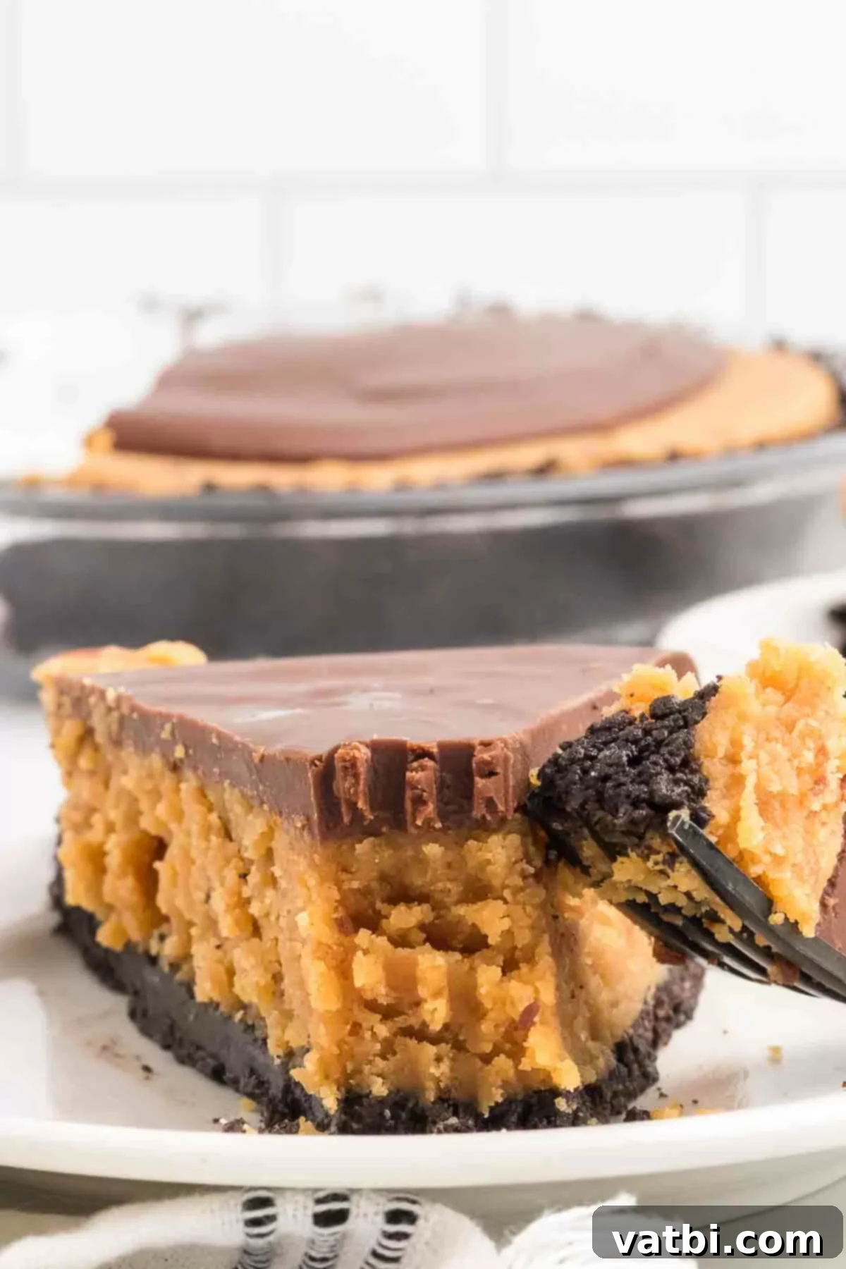 Decadent Buckeye Pie 10 Buckeye pie sliced on a plate.