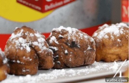 Golden Fried Delights 5 Unique Deep Fried Coca-Cola Balls, golden and intriguing, ready to be served, an unexpected sweet fairground treat.