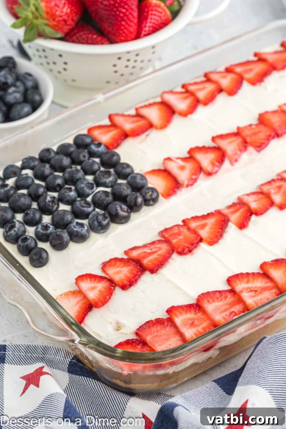 Stars and Stripes Dessert 10 American Flag Cake ready to serve, perfectly decorated with blueberries and strawberries.