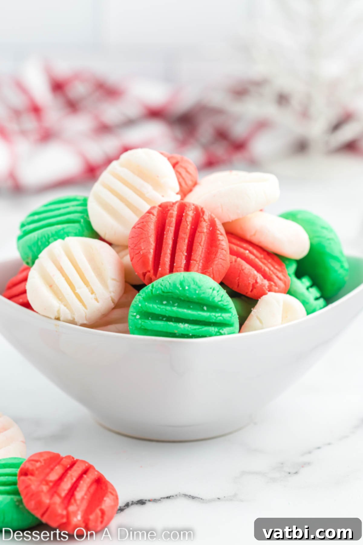 Holiday Mint Magic 9 Finished Christmas mints displayed attractively in a bowl, ready to enjoy.