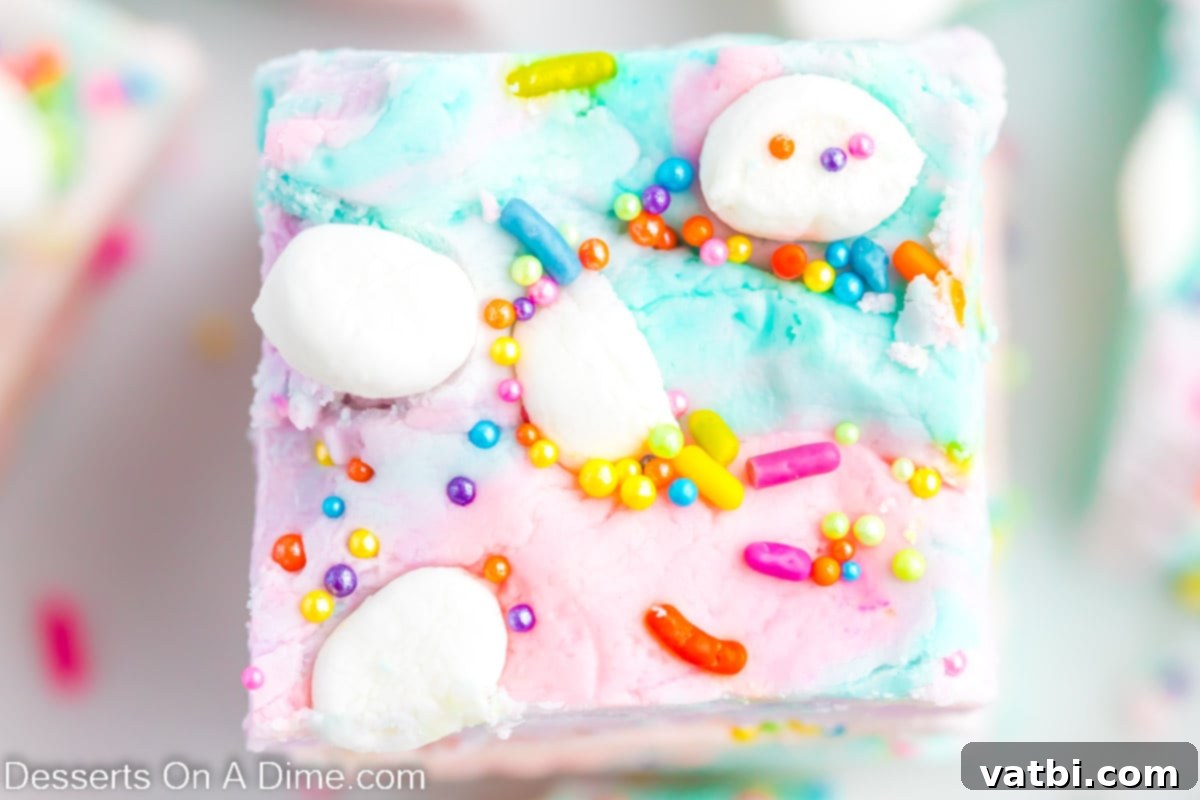 Rainbow Unicorn Fudge 2 Unicorn Fudge cut into squares and topped with sprinkles.