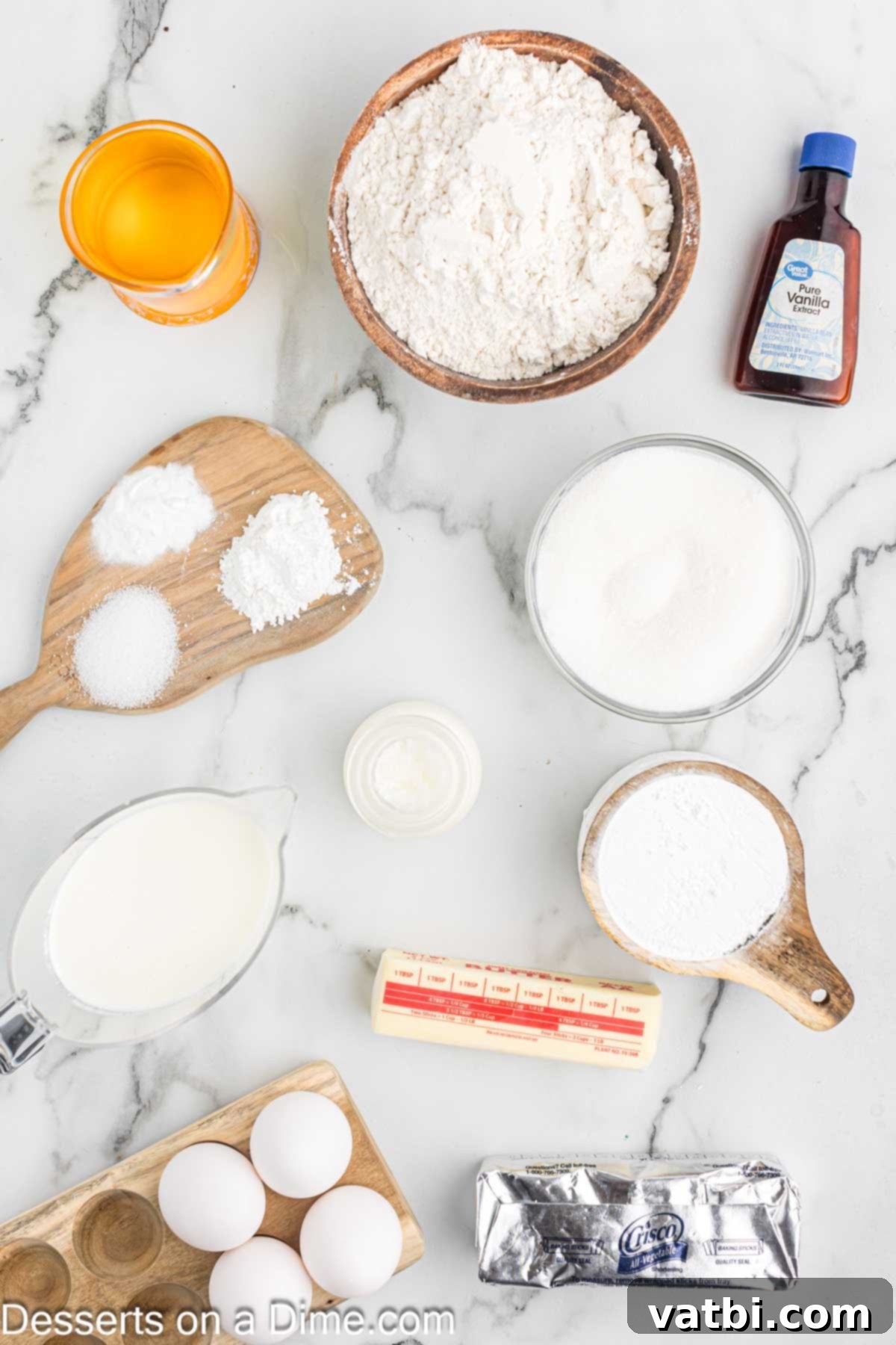 Ingredients for cupcakes - all purpose flour, bakign powder, baking soda, vanilla, oil, buttermilk, eggs, shortening, powdered sugar. 