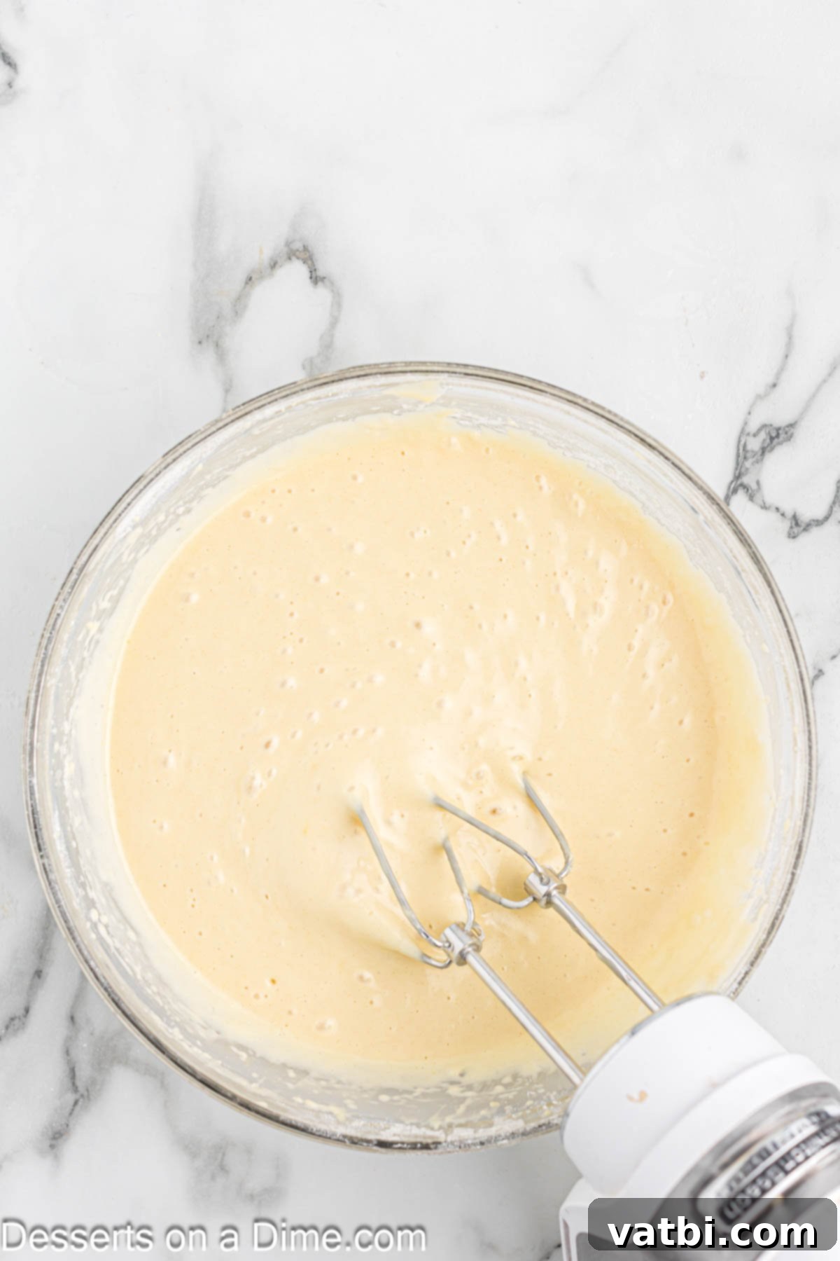Oil and vanilla added to mixture. 