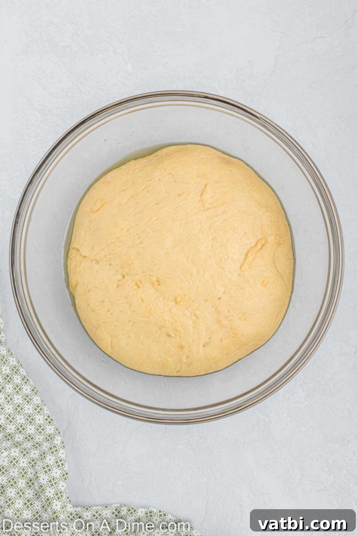 Homemade Krispy Kreme Doughnuts: The Ultimate Guide 9 Dough placed in an oiled bowl to rise.