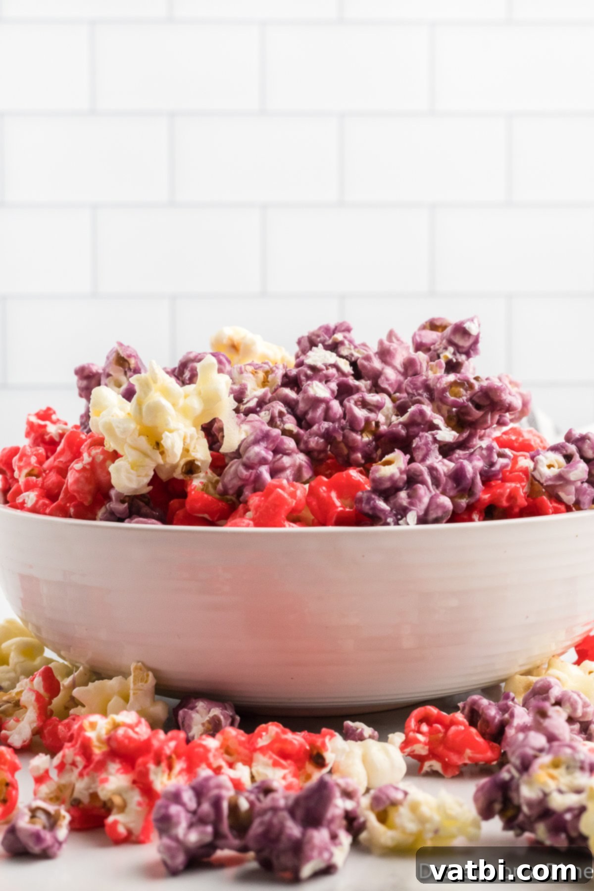 Colorful Kool-Aid Popcorn 10 Koolaid popcorn in a bowl.