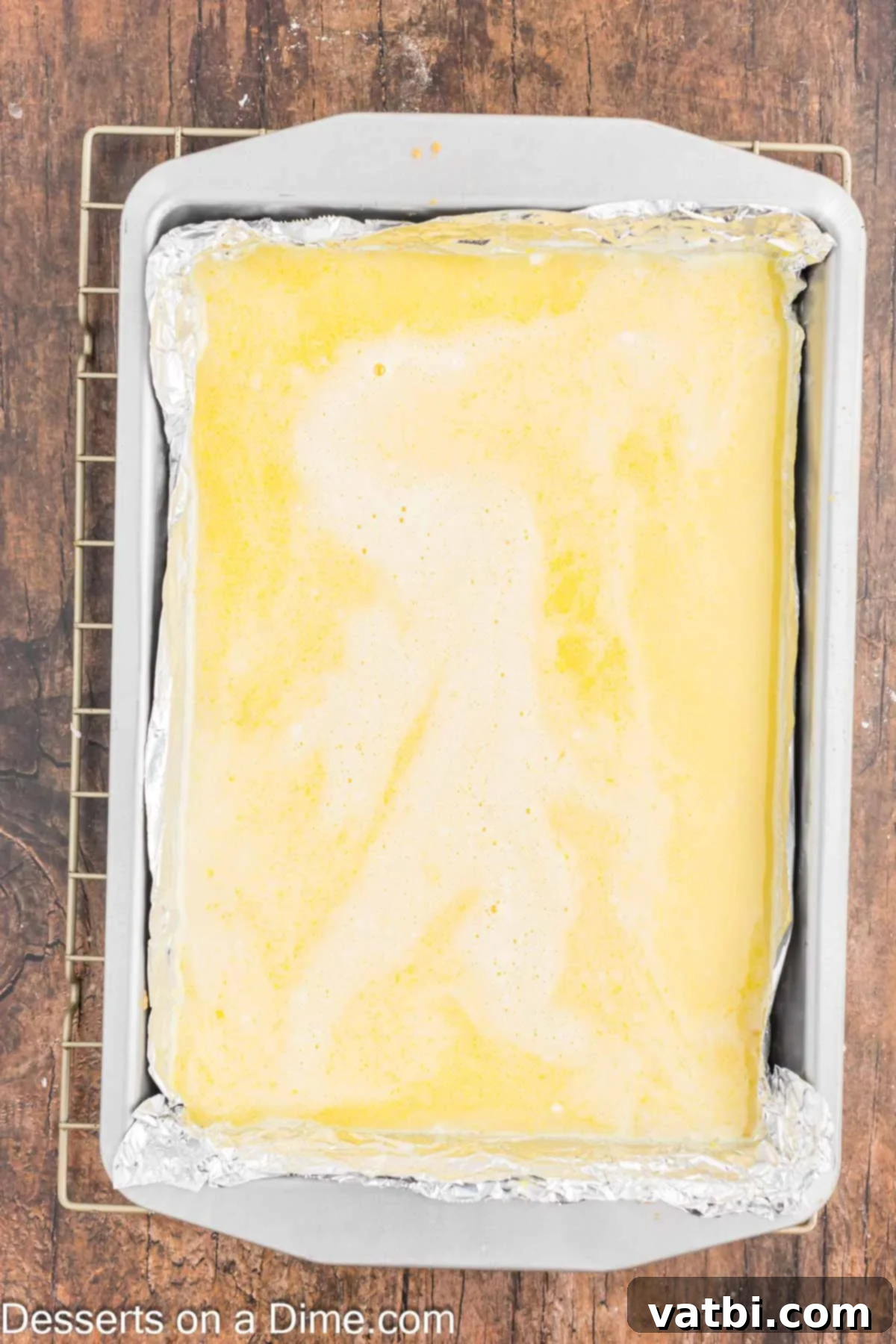 Grandma's Irresistible Lemon Squares 5 Lemon filling poured on top of pie crust.