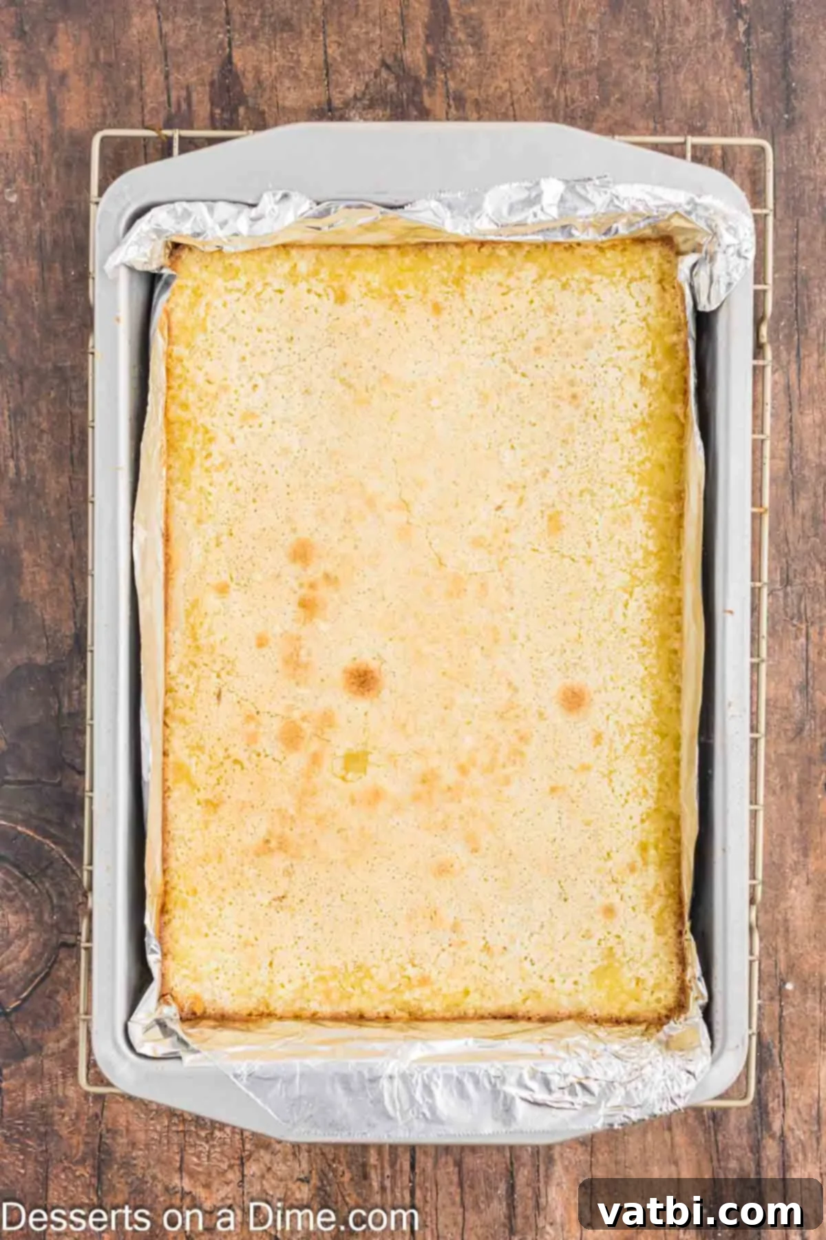 Grandma's Irresistible Lemon Squares 6 Lemon bars baked and cooling.