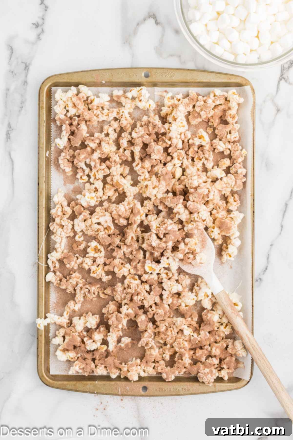 Velvet Chocolate Popcorn 7 Hot chocolate mix sprinkled on popcorn.