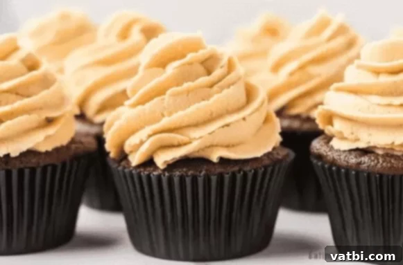 55 Winning Super Bowl Desserts 5 Chocolate peanut butter cupcakes with creamy frosting.