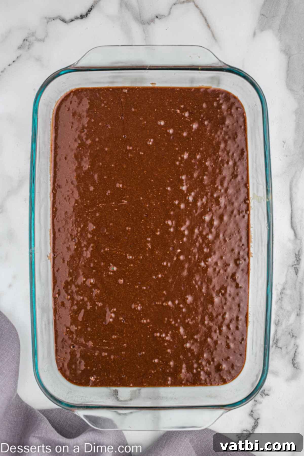 Ruby Swirl Raspberry Cheesecake Brownies 4 Brownie batter evenly poured into a prepared 9x13 inch baking dish