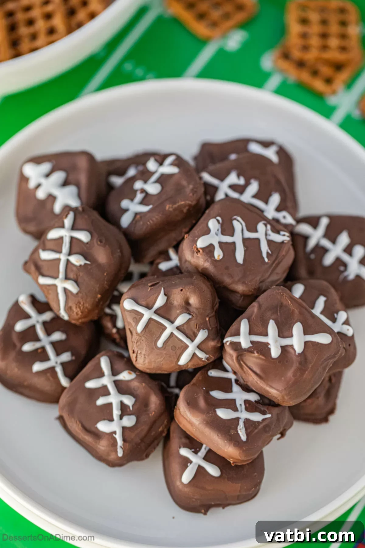 Finished Football Chocolate Covered Pretzel Cookies artfully arranged on a platter, ready to serve for a game day celebration.
