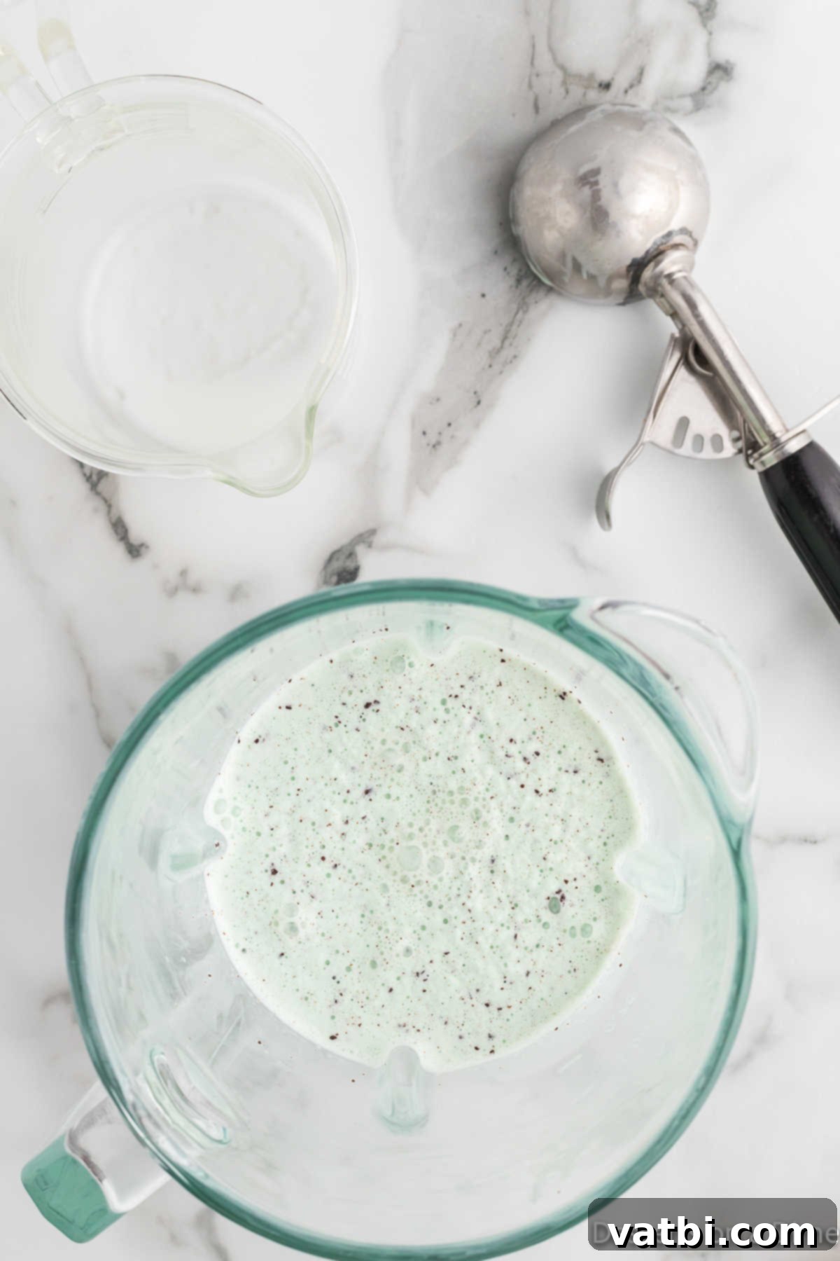 Ultimate Mint Chocolate Chip Milkshake 5 Mint chocolate chip ice cream and milk blended together into a smooth mixture.