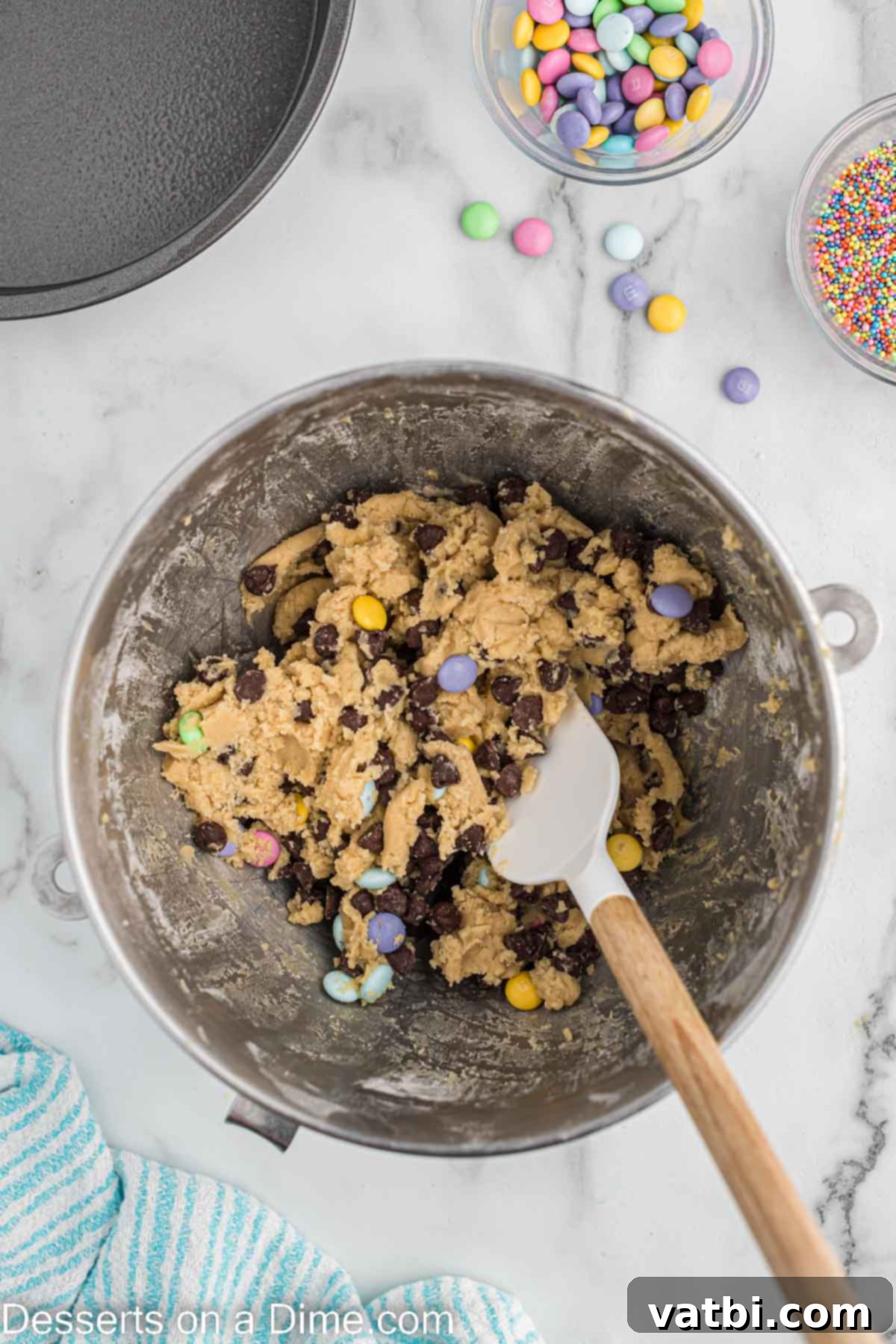 Hoppy Easter Cookie Bake 6 Chocolate chips and M&M's folded into dough.