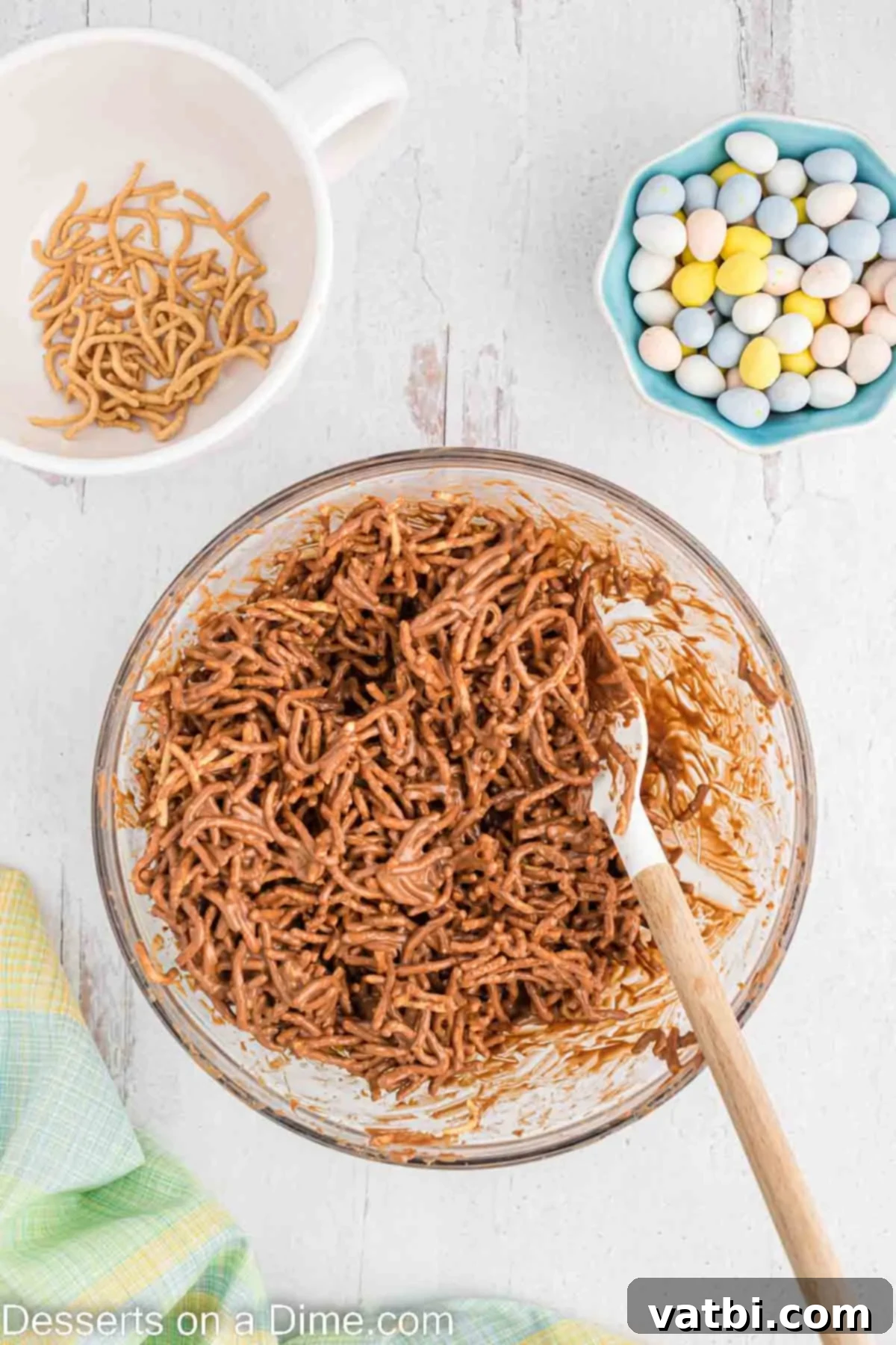 Chow mein mixed into mixture.