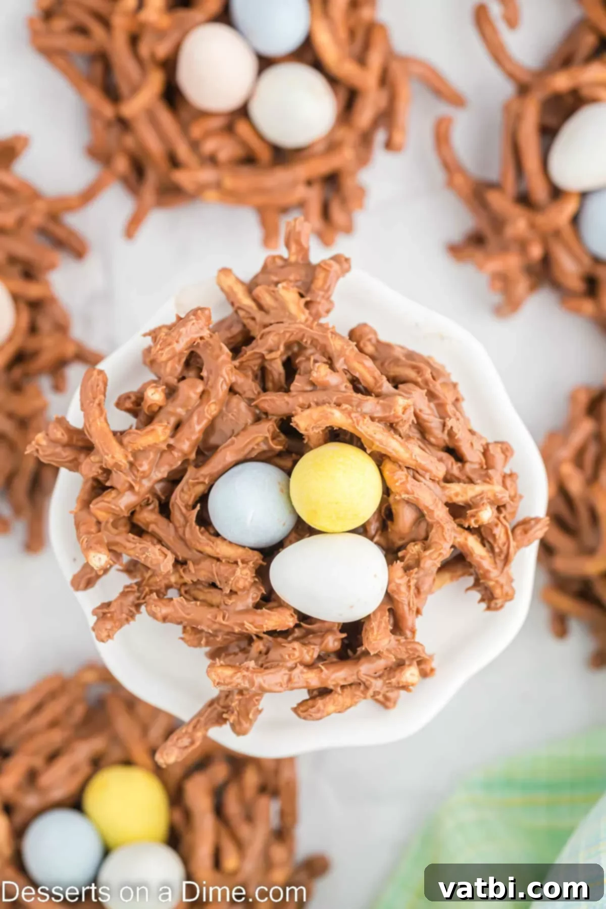 Candy eggs placed into nests.