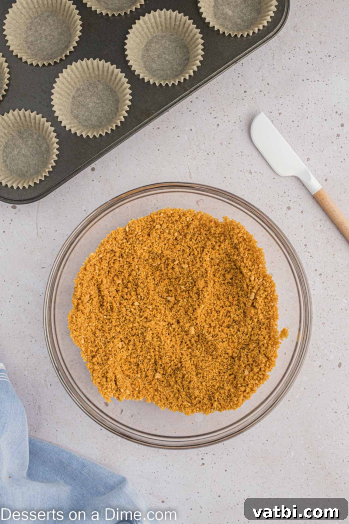 Easter Cheesecake Bites 4 Bowl with graham cracker crumbs.