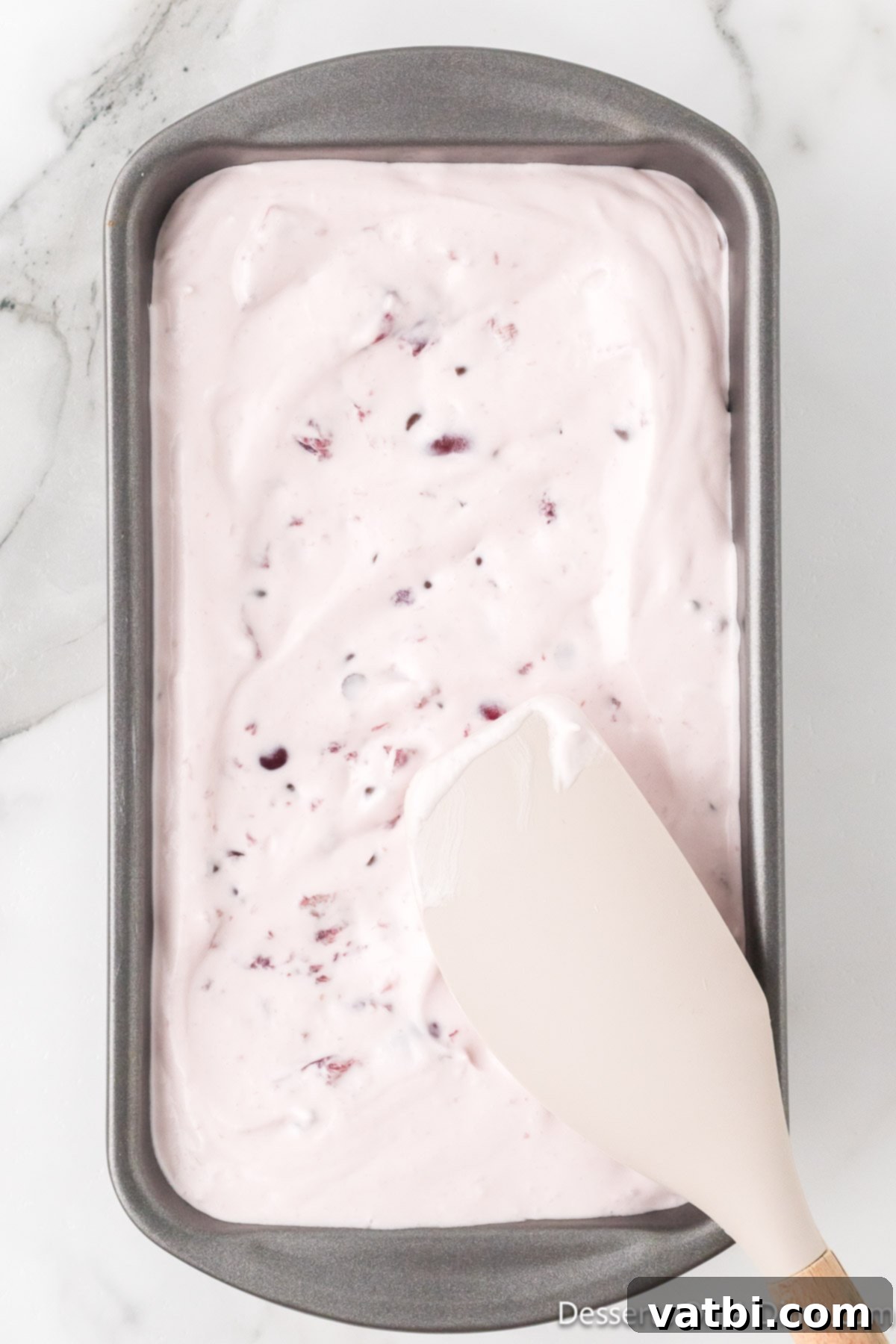 Cherry Chocolate Chip Ice Cream 8 The ice cream mixture poured into a loaf pan, ready for freezing.