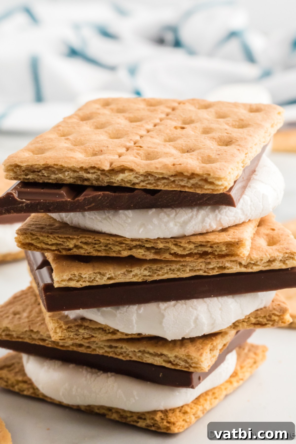 Perfectly stacked Air Fryer S'mores with melted chocolate and toasted marshmallows, ready to be enjoyed.