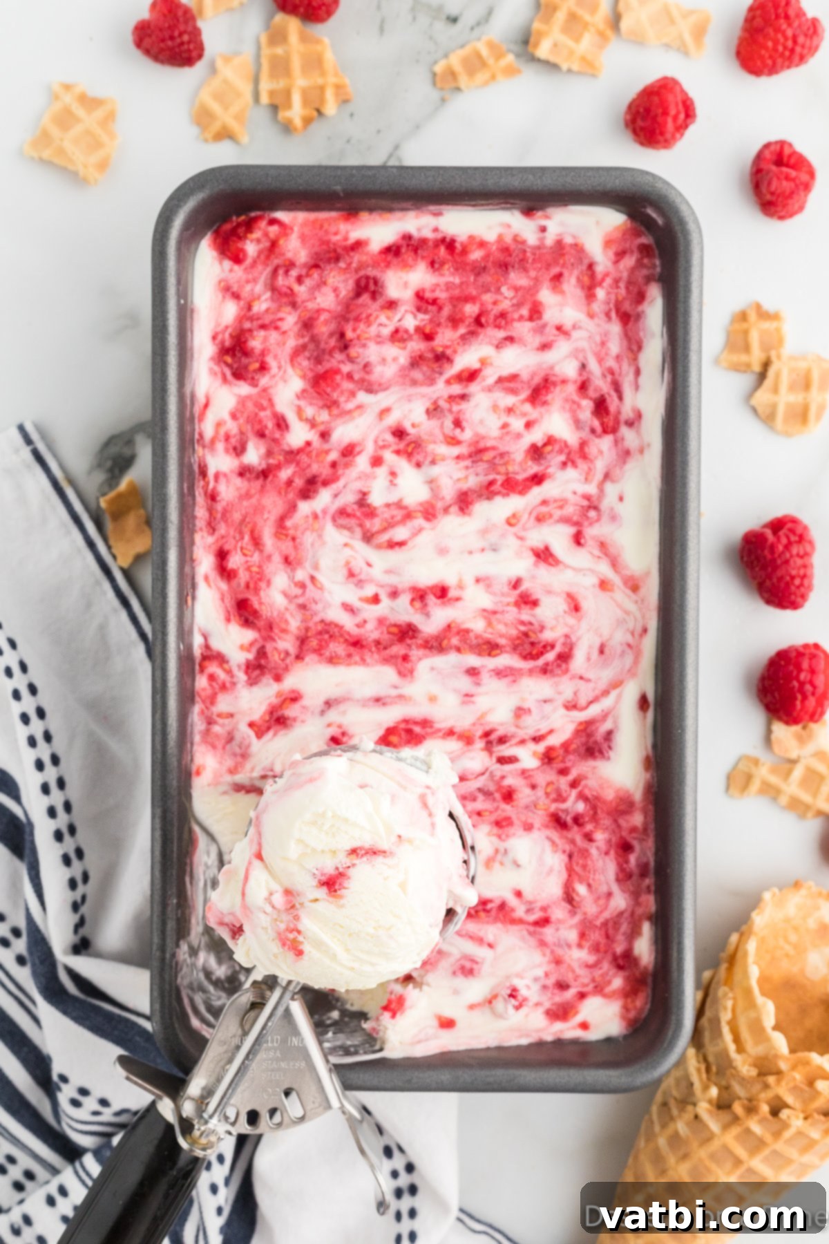 White Chocolate Raspberry Dream 2 White chocolate raspberry ice cream in loaf pan, ready to serve.
