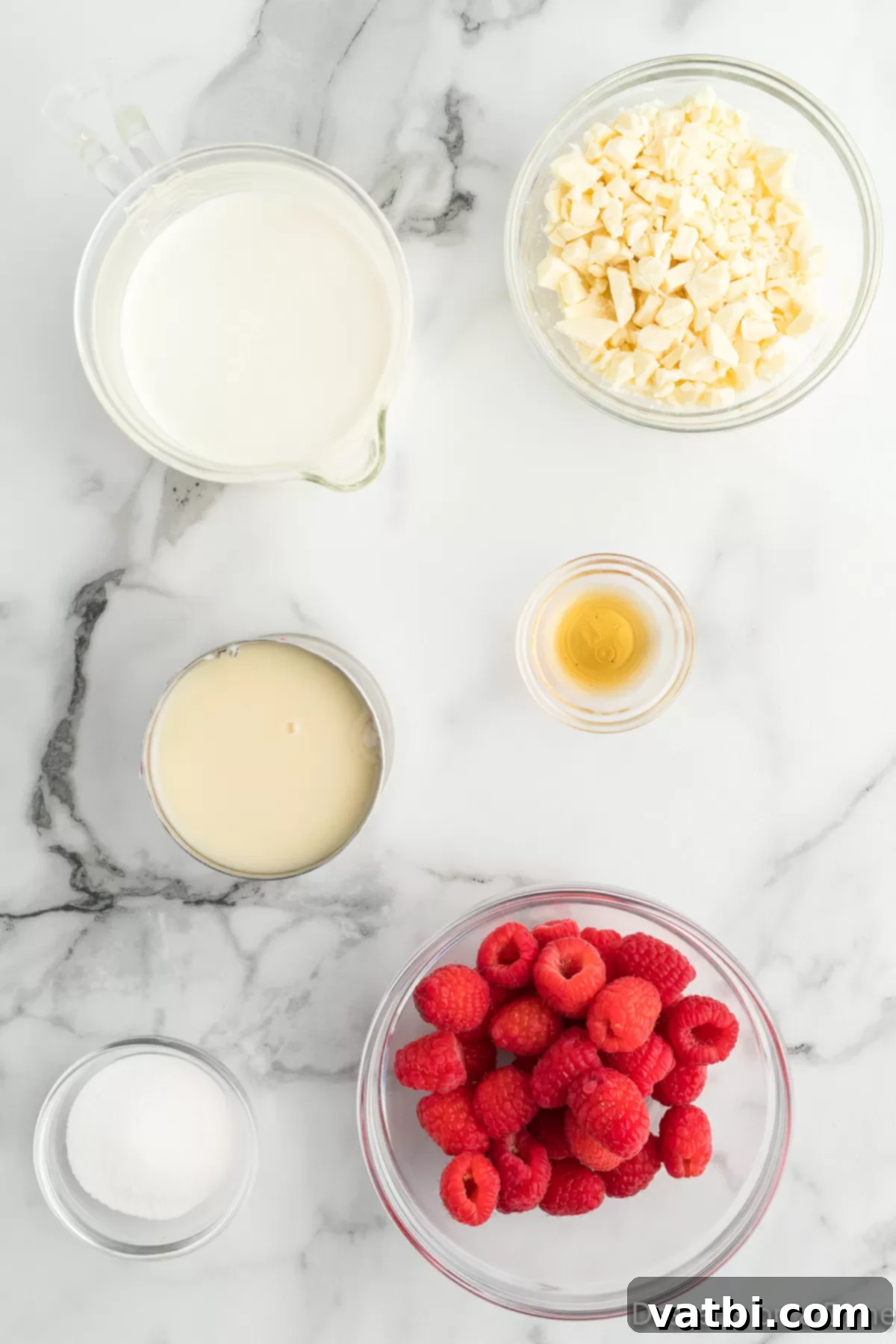 White Chocolate Raspberry Dream 3 Ingredients for White chocolate raspberry ice cream - heavy whipping cream, fresh raspberries, sweetened condensed milk, vanilla extract, and white chocolate.