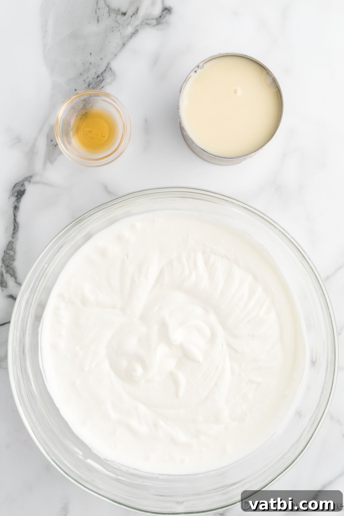 White Chocolate Raspberry Dream 7 Heavy cream whipped to soft peaks in a large mixing bowl.