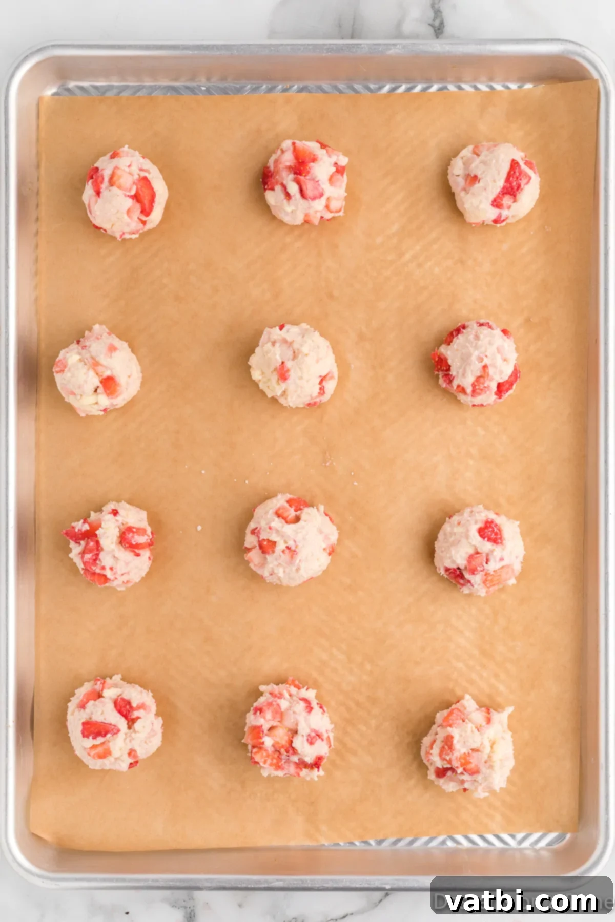 Cookies scooped and placed on baking sheet. 