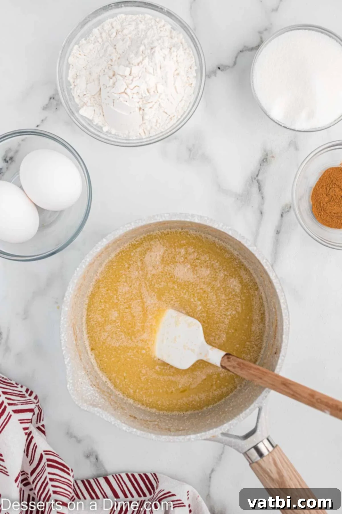 Crispy Air Fryer Churros 4 Melted butter and cinnamon combined in a saucepan, forming the flavorful liquid base for the churro dough.