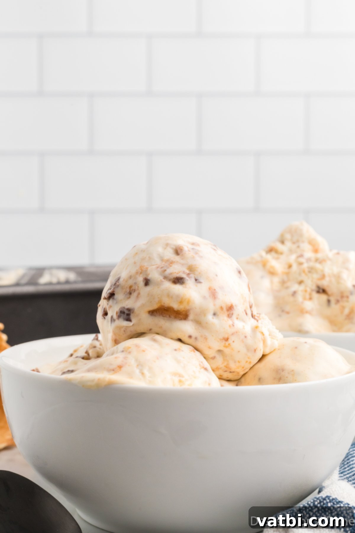 Crunchy Homemade Butterfinger Ice Cream 2 Bowl of Butterfinger ice cream in a bowl.