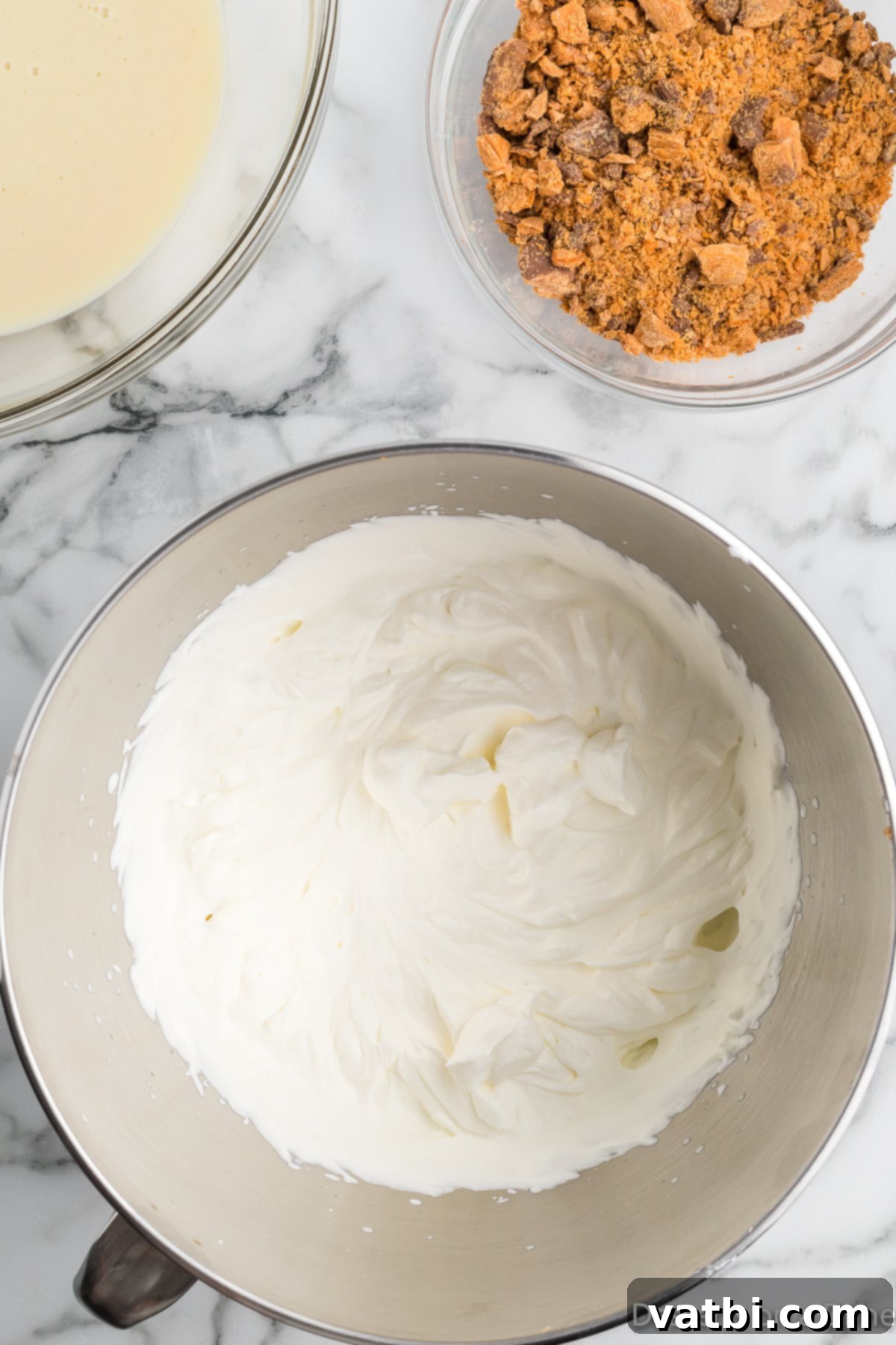 Crunchy Homemade Butterfinger Ice Cream 6 Heavy whipping cream in bowl.
