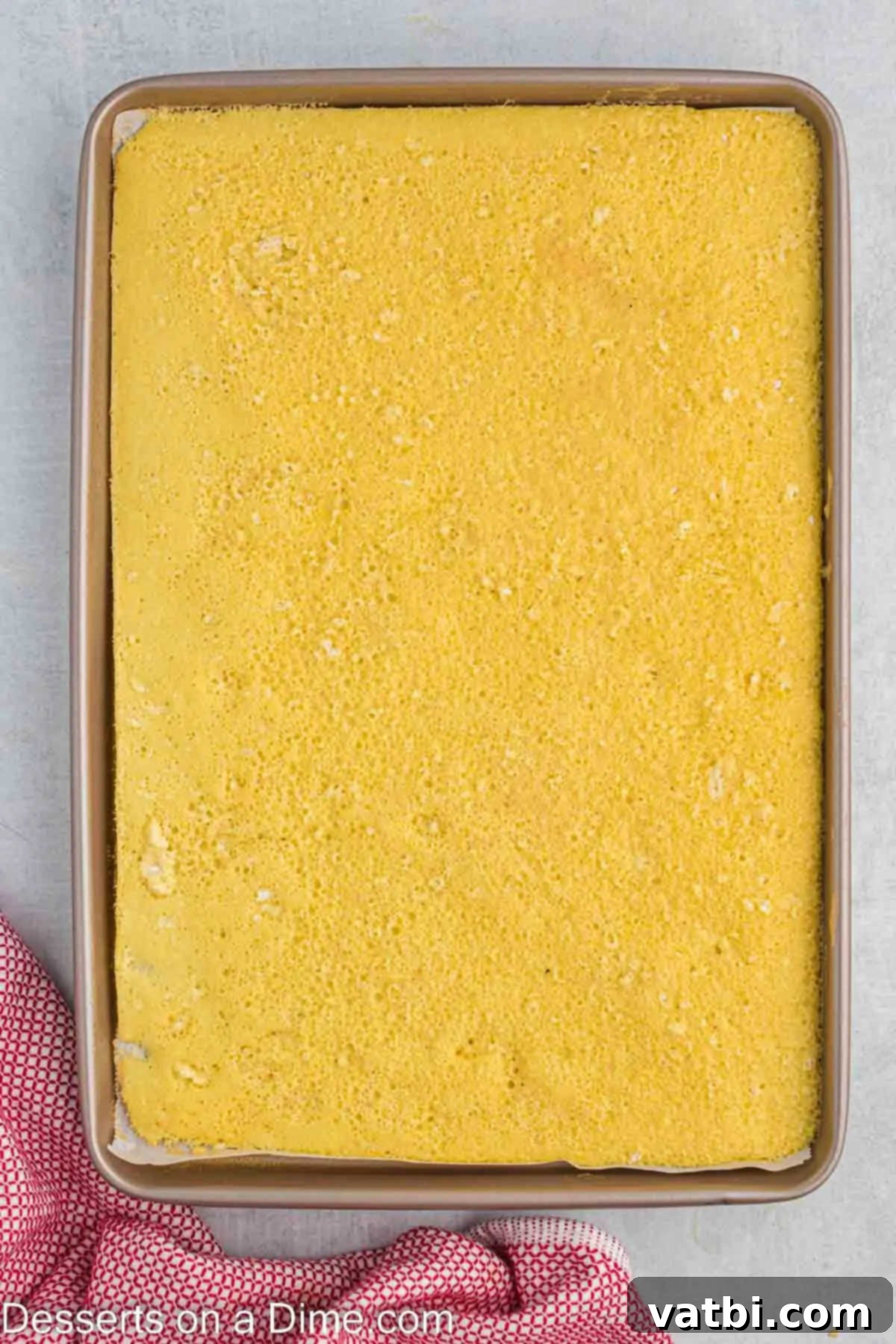 Strawberry Shortcake Swiss Roll 6 Cake baked in pan.