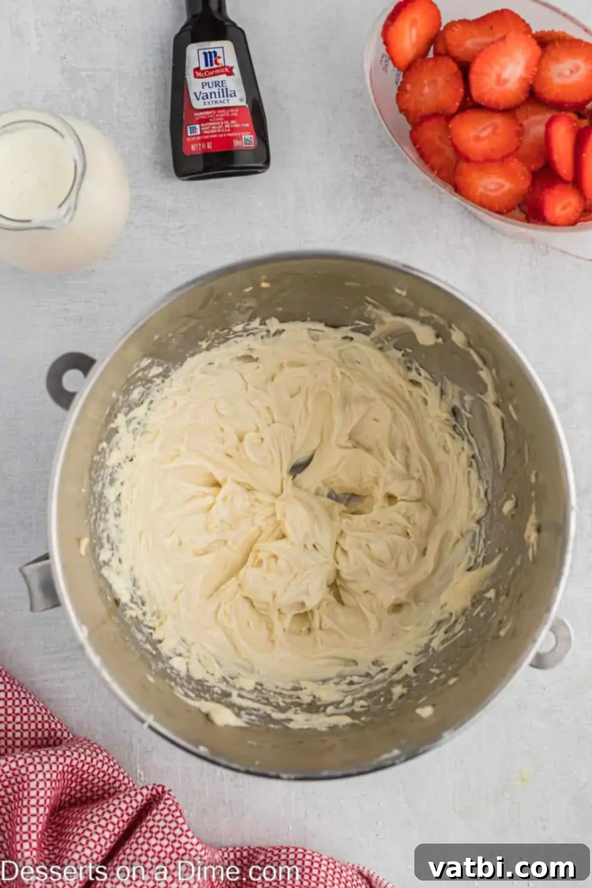 Strawberry Shortcake Swiss Roll 8 Cream cheese and sugar in a bowl.
